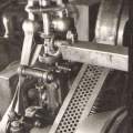A Woodward horizontal compensating type governor (size F).